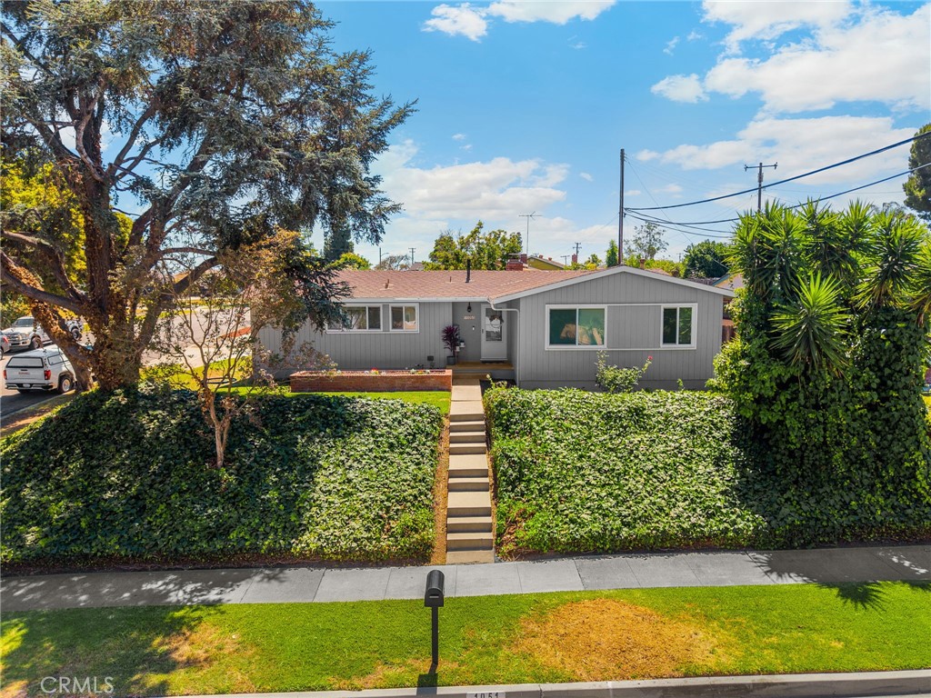 Wonderful and charming La Habra property that is waiting for you to call it home! This lovely and private home offers 1,331 square feet of living space with 3 bedrooms and 2 bathrooms. Beautifully remodeled home with natural light, fresh paint, new vinyl wood floors throughout home and a customized designer fireplace. This incredible home also offers dual pane windows, a remodeled and modern kitchen with Stainless Steel Appliances, stone counters, Designer Lighting, and a water filtration system. Washer and dryer room, a new water heater, new backyard hardscape, and a water softening system throughout the entire house all offer luxuries you deserve. The primary bedroom includes access to the back yard, a roomy walk in closet, and a private bathroom with dual sinks. Large 8,000 square foot lot includes a private backyard with a swing set, a stand-alone 2 car garage, and RV parking perfect for your getaway toys. What an amazing neighborhood this home is situated in! This home is located north of Whittier Blvd and is in the fabulous Lowell Joint Unified School district with Macy Elementary, Rancho Starbuck Junior High, and La Habra High School as great school options. Close to shopping, parks, and a wonderful community, this home has everything close by for your convenience. You must see this lovely home to really appreciate it. Hurry, a home like this will not last long! Welcome Home to 1051 Russell Street, La Habra!