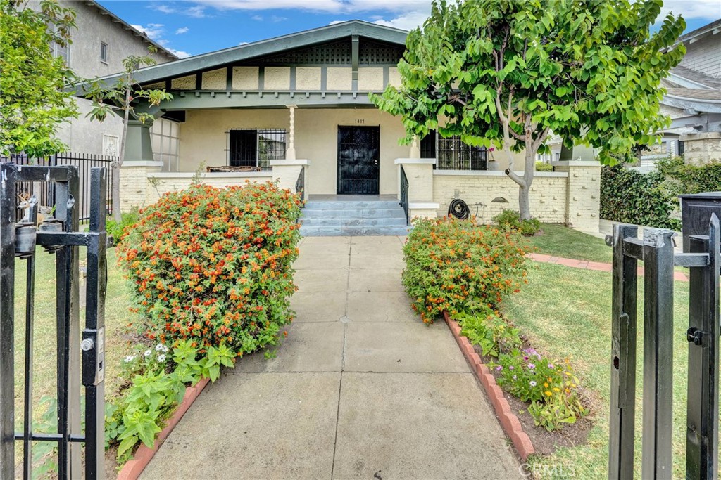 Own a true classic home in the heart of LA! Brimming with character, this 5-bedroom Craftsman is the perfect opportunity for someone ready to add cosmetic artistry to a well-cared for home — and build instant equity doing it. Fall in love with the classic architecture: a deep covered front porch, original built-ins, stone fireplace, and mature citrus trees that frame the property from front to back. Downstairs you'll find 3 bedrooms and 1 bathroom. Upstairs you'll find 2 bedrooms and 1 bathroom, plus a bonus room and additional closet space. The oversized two-car garage offers endless possibilities — workshop, studio, or future ADU — while the LARD2 zoning opens the door to additional units. Ideally situated on a street with no through traffic, this home is just minutes from LA’s best: Re/creation Cafe, Pasta Sisters, Jewel’s Catch One, Midtown Crossing and more. Mid City is an ideal location to reach almost everywhere in the city. Move-in ready homes with original details stand out from the rest... all it needs is your vision to call home.