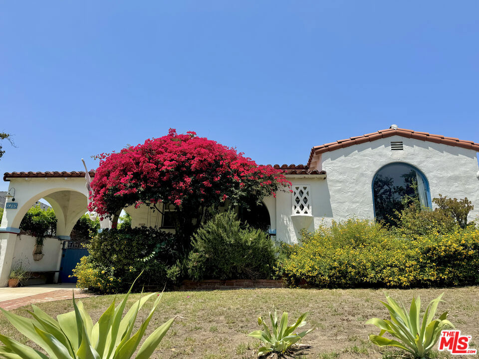Available for a one-year lease and month-to-month thereafter, this beautifully maintained Spanish-style residence in Glendale's desirable Northwest foothills is offered unfurnished or fully furnished, providing flexibility to suit your lifestyle. Built in 1935 and filled with vintage charm, the home features three bedrooms and two bathrooms across approximately 2,005 square feet of living space. A formal living room with coved ceilings, picture windows, and original fireplace opens to a separate dining area and cozy den. A recently added family room with custom windows and French doors creates a bright, welcoming space that opens directly to the backyard for seamless indoor-outdoor living. The remodeled kitchen includes stone countertops, stainless steel appliances, and ample storage. Each bedroom offers generous space, and both bathrooms have been tastefully updated. Central air and heat ensure year-round comfort.Outside, enjoy a private, hedged backyard with patio space and a built-in barbecue areaideal for dining and entertaining. A dedicated laundry room with washer and dryer is included.Additional features include a Charge Point EV charger, driveway parking for two vehicles, and ample permit-free street parking. Located between Kenneth Road and Olmsted Drive with convenient access to the 134 and 5 freeways, Brand Park, Kenneth Village, and Montrose. Zoned for Glendale Unified School District: Balboa Elementary, Toll Middle, and Hoover High. Tenant pays all utilities except gardener. Pets considered on a case-by-case basis. Security deposit equal to one month's rent. Delivered unfurnished by default, the home is also available fully furnished with thoughtfully curated, high-quality pieces throughout. From stylish bedroom sets to comfortable seating areas and elegant dining furnishings, the turnkey setup blends warmth, functionality, and design.
