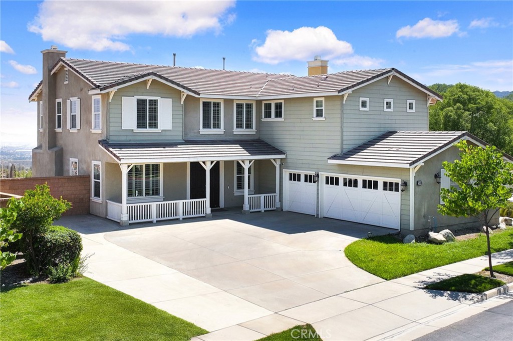This stunning home in Rancho Etiwanda Estates offers breathtaking city and mountain views. Inside, you'll find porcelain tile flooring, a spacious kitchen with granite countertops, a center island, stainless steel appliances, and a butler’s pantry. The downstairs includes a bedroom and full bath, while the upstairs features a loft and four more bedrooms, including a luxurious primary suite with a walk-in closet.
The low-maintenance backyard provides plenty of space for customization. Conveniently located near hiking trails, Victoria Gardens, and major freeways, with top-rated schools nearby. Solar panels are leased with no monthly fee; you only pay for the electricity used.