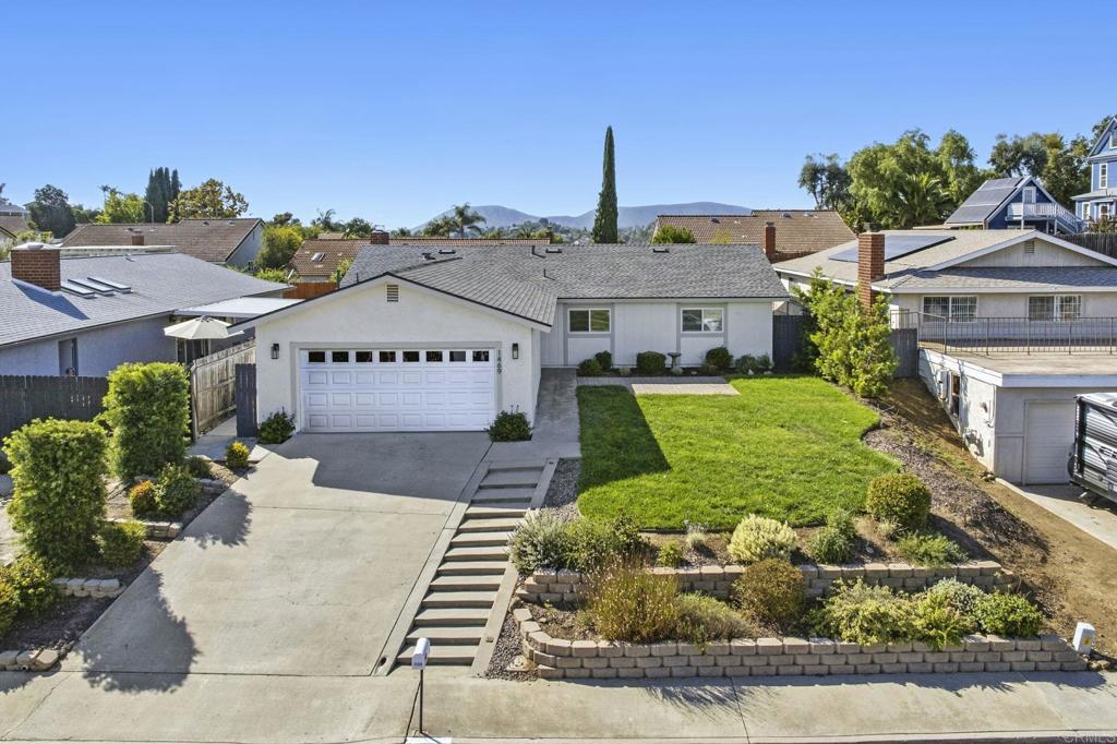 Turn-Key 4 Bedroom Single Story Pool Home! This beautifully updated one-story level home offers a rare 4 bedroom, 2 bathroom home in an open and inviting living space on a generous 7,500 sq. ft. lot. Recent upgrades include NEW ROOF and new paint. The light-filled interior features gorgeous bamboo wood flooring throughout and newer windows, including a double-opening slider for indoor-outdoor flow. Entertain in the spacious family room with a stone fireplace or the covered outside patio, equipped with market lighting. The contemporary kitchen is a standout with granite countertops and center island with seating, stainless steel appliances including a hood, kitchen nook and white cabinetry. The primary bedroom features a large walk-in closet and an updated ensuite bathroom with vanity and tile shower. There’s also a hallway bathroom featuring a vanity and bathtub and there are three additional bedrooms. Step outside to your private backyard retreat with a PebbleTec pool (refinished in 2020) and newer pool decking or the welcoming front patio with room to sit, overlooking the Glen Avon HOA private park. Additional features include air conditioning and ceiling fans providing comfort year-round, custom lighting, smart irrigation system, Arlo doorbell camera and an attached 2 car garage with new epoxy. Just steps from Glen Avon and Knob Hill park, it is also located near highly desirable Knob Hill Elementary, Woodland Middle, and Mission Hills High schools, shopping, dining, and has easy freeway access. This move-in ready property is a unique San Marcos gem!