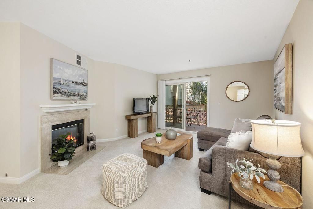 Photo of 697 Sutton Crest Trail #302, Oak Park, CA 91377 (MLS # 225005984)