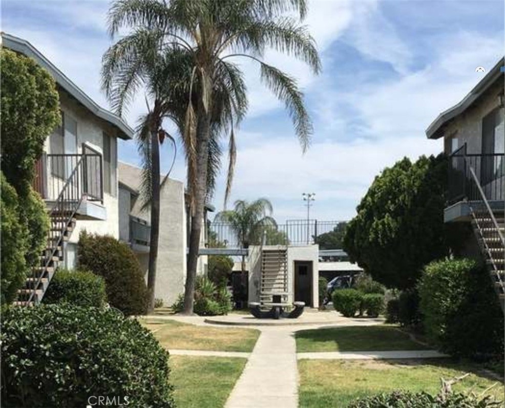 Two bedroom condo with upgrades! Upstairs unit. Wood floors throughout the home. The kitchen has a newer dishwasher. The windows, central Air conditioning and heating unit are newer. The bathroom has been updated including a new tub. A great location near Sierra Avenue and minutes away from shopping and freeways. Community laundry area. The small complex is next to a park with a baseball field, playground area, picnic area and basketball court!! The HOA covers insurance, water, sewer and trash