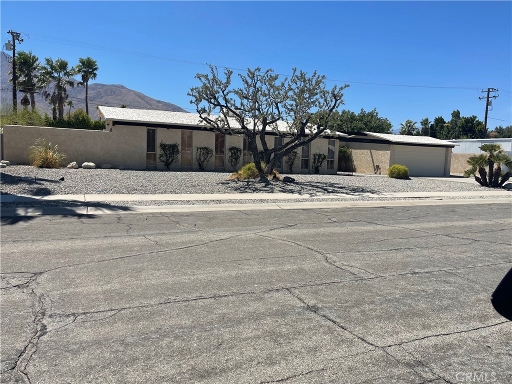 Great Opportunity to purchase a Mid Century Modern home and remodel it the way you want. A 3 bedroom 2 bath with a beautiful pool and jacuzzi. This Alexander home was built in 1961. This home was owned by the same owner since 1969. It's mostly original, but a sauna was added in the master bath area and looks just like new. It's been well maintained, but could use updating to bring it back to it's original glory. The home is being offered as is. This is a trust sale.