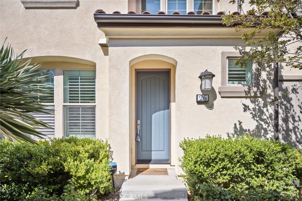 Welcome to your dream home in the prestigious, no Mello-Roos Baker Ranch community! This stunning end-unit, two-story townhome spans a spacious 1,655 square feet, bathed in natural light and boasting one of the largest private courtyards in the neighborhood.
Crafted by Shea Homes, this turnkey 2 bedroom + loft, 2.5 bath residence is packed with premium upgrades. The versatile loft offers easy conversion to a third bedroom, adding flexibility for your needs.
Step inside to discover elegant oversized tile flooring, gourmet kitchen with custom herringbone tile backsplash, and plantation shutters throughout. Upstairs, enjoy the amazing striking stone accent wall, sleek industrial-style wire stair railing, ceiling fans with lights, and durable luxury vinyl flooring on the stairs and second level. Additional highlights include newly finished epoxy garage floor, water softener and a 240V EV charging outlet.
Experience resort-style living with Baker Ranch’s exceptional amenities: sparkling pools and spas, multiple parks, clubhouses, hiking trails, and courts for tennis, pickleball, and volleyball. Enjoy low HOA dues, no Mello-Roos, and proximity to top-rated schools, shopping, dining, and entertainment. This spacious, luxurious home perfectly blends comfort and community. Don’t miss your chance to own one of the best homes in Baker Ranch!