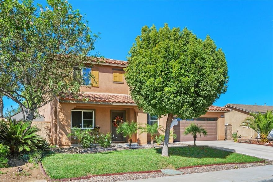 Welcome to this stunning turnkey home featuring a spacious open floor plan with separate living, family, and dining rooms — perfect for entertaining and everyday living. The remodeled kitchen is stunning, offering granite countertops, a stylish backsplash, a breakfast bar, and stainless-steel appliances. It opens seamlessly to the living area and is conveniently adjacent to the dining room, creating an inviting flow throughout the main level.

Downstairs features upgraded flooring, neutral tones, and a bedroom with a full bathroom—ideal for guests or multi-generational living. Upstairs, the primary suite offers a relaxing retreat with an en-suite bathroom, featuring a separate shower, soaking tub, and a walk-in closet. Two additional spacious bedrooms, a large secondary bathroom with a tub/shower combo, and a laundry room conveniently located upstairs complete the upper level.

Step outside to enjoy a large backyard with fruit trees, providing the perfect setting for outdoor gatherings and summer BBQs. Additional perks include a washer, dryer, and refrigerator—all included! Located close to shopping, parks, and walking trails, this home offers the best of comfort and convenience in a beautiful Menifee neighborhood.