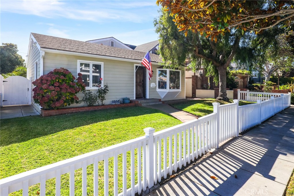 Rare 45 foot wide lot. Welcome to your coastal retreat. Amazing opportunity to purchase an oversized lot on a tree lined street south of coast Highway in Corona del Mar. This home is only 1 block from the beach and features a 3 bedroom main house with a 2 bedroom back unit over the 3 car garage plus a parking pad. Living room with fireplace, vaulted ceilings, and a beautiful bay window. Main floor has 2 spacious bedrooms, kitchen, bonus room, bathroom. There is a 3rd bedroom upstairs and a bathroom. The large unit over the garage has direct access to the house as well as a separate private entrance with a balcony. The spacious backyard is your private escape, ideal for coastal evenings and weekend gatherings! Close proximity to shops, restaurants and fashion island!