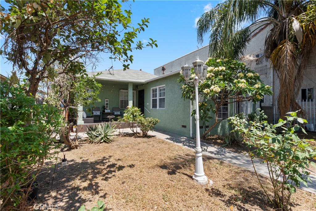 This property features the perfect combination of comfort and convenience. Just minutes from Downtown LA, you’re surrounded by vibrant culture, amazing cuisine, and some of the most popular shopping centers in the area. Easy access to the major freeways , making your commute effortless.The main home is cozy and inviting. The living room is perfect for family gatherings or quiet nights watching TV along with a dedicated dining area perfect for Sunday family meals or entertaining. Also, for your convenience there is an indoor laundry room that adds functionality to your everyday living. There's a separate dwelling Unit (ADU) included with its own kitchen, dining area, a private bedroom and a bathroom , it’s ideal for extended family, or even your own creative studio or home office.