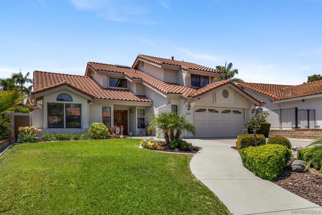 In the heart of the highly sought-after Shadowridge community, this beautifully maintained 3BR/3BA home lives like a single story home. A grand entry with oak staircase leads to formal living and dining spaces, while the updated kitchen with granite counters opens to both the family room and the new covered patio—perfect for seamless indoor-outdoor entertaining. The main-floor primary suite features dual walk-in closets and a private bath, with two additional bedrooms and full bath upstairs. Enjoy the benefits of newly installed AC, a metal patio cover, and professionally landscaped resort-style grounds with avocado and lemon trees. A two-car garage and whole-home water filtration system complete this exceptional property.
