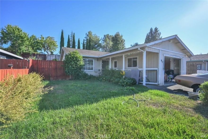 This single-story home offers an excellent opportunity for homeownership or investment in a convenient Willits location. Featuring 2 bedrooms and 1 bathrooms, the property provides a comfortable layout with a bright living space and an updated bathroom complete with dual vanities and modern finishes. The large backyard is a standout, offering a spacious deck and tiered landscaping potential perfect for entertaining, gardening, or creating your own private retreat. The front yard provides great curb appeal potential with a fenced-in area and mature greenery.