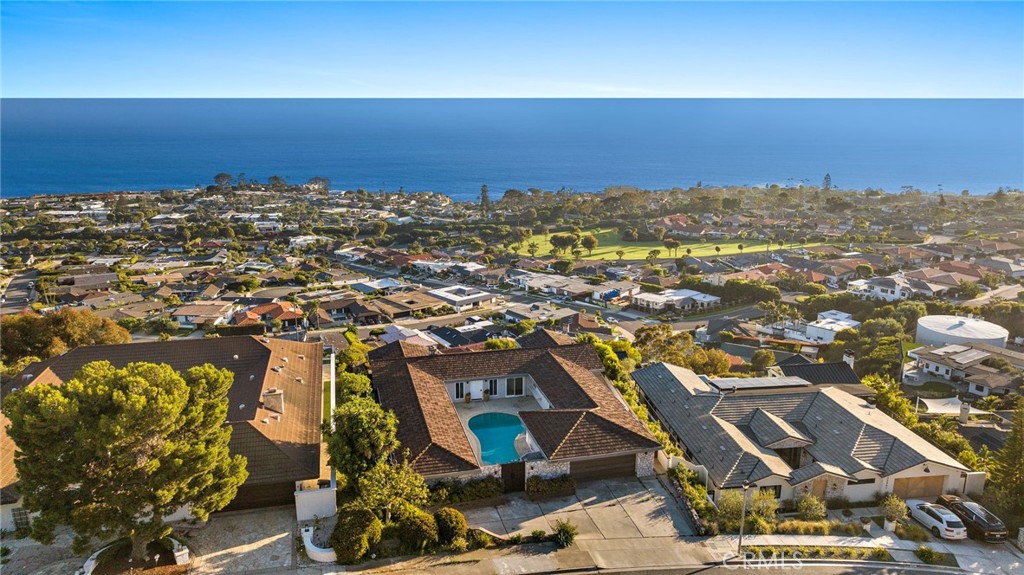 Experience the pinnacle of coastal living in this stunning residence, where sweeping 180-degree ocean views create a breathtaking backdrop that words simply can't capture—this is a must-see in person.
Thoughtfully designed for both serene everyday living and effortless entertaining, this exceptional home boasts a private courtyard complete with a sparkling pool and soothing jacuzzi. The outdoor patio offers the perfect setting for unforgettable gatherings with family and friends.
Generous closet space enhances the home’s livability, while beautiful windows throughout showcase stunning views. Outside, the sparkling pool is surrounded by sleek concrete decking, creating a seamless space for lounging and entertaining. Whether you're seeking a peaceful retreat or a vacation-inspired haven, this home offers the best of both worlds.