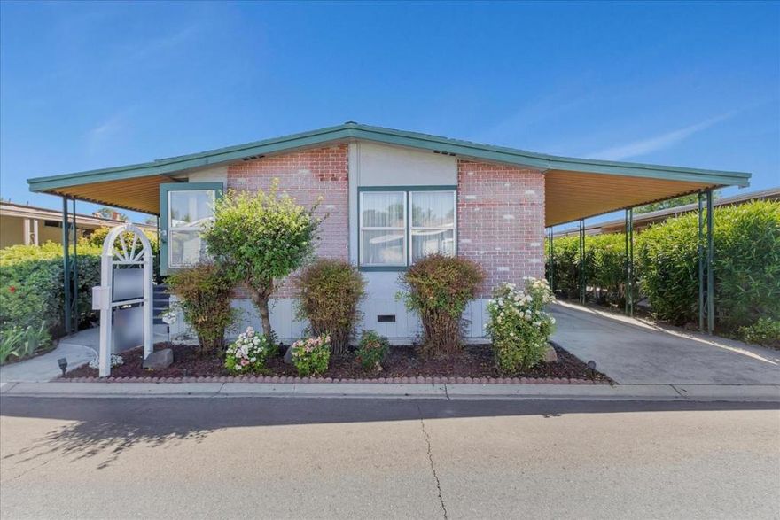 Comfortable, affordable, and move-in ready home in the desirable 55+ senior community of Millpond. The 2 bedroom, 2 bathroom home offers an inviting floor plan highlighted by large double paned windows and plush carpeting throughout the living room, family room, and dining areas. The kitchen is boasts ample cabinet space, a breakfast bar, a corner pantry, and a window above the sink bringing in plenty of natural lighting. The family room has access to the screen room, which can be used as a storage room, home office, or hobby room. The master bedroom boasts a large closet and private bathroom. The secondary bedroom is a comfortable size with great closet space. Embrace the sense of community with nearby walking paths and parks, while enjoying the convenience of being just moments away from shopping and dining options.