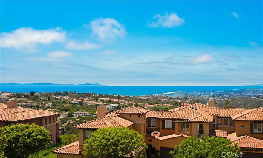 Set within the prestigious gated enclave of Altezza in Newport Coast, this newly renovated residence, completed in 2025, captures sweeping panoramic vistas—spanning the Pacific Ocean, Catalina Island, Newport Harbor, sparkling city lights, and the distant Saddleback Mountains. The home offers a rare blend of elegance, comfort, and coastal sophistication. Upon entering the property, one will notice a highly refined level of detail...often not found at this price point or property level. Nearly every aspect of the property remodel was thought of during its 15 month renovation process. From new floorings, custom millwork and cabinetry, lighting, stone selections, AC Systems and air scrubbers, bathrooms, the garage, and much more, this property is a true example of what a "move in ready" property is suppose to feel like. Upon entering, the property foyer and view greet you simultaneously, effortlessly showcasing the unique property position on the hill. Walking through the entry level, one will notice a main level bedroom with a well appointed bathroom, dining room, kitchen framed by ocean views and a private patio pavilion, open breakfast nook, and large family room with double vaulted ceilings. The family room is further highlighted with a dramatic stone fireplace, well positioned to create a cozy environment for relaxation and rejuvenation. Upstairs, the expansive primary suite is a true retreat, complete with a private balcony showcasing exceptional views, and a spa-style bath featuring dual vanities, a soaking tub, and separate shower. A secondary en-suite bedroom completes the upper level along with a spacious bonus room. The property also showcases a full laundry room and direct access 2 car garage that has been beautifully upgraded with flooring, cabinetry, lighting and a new garage door system. This property also features direct access to the Newport Coast Community Center and Clubhouse, featuring a Junior Olympic saltwater pool, sport courts, and kitchen with lounging areas. Rounding out this property is immediate proximity to scenic trails, top-rated schools, and world-class shopping and dining at Fashion Island, The Newport Coast Shopping Center, and the Pelican Hill Resort.