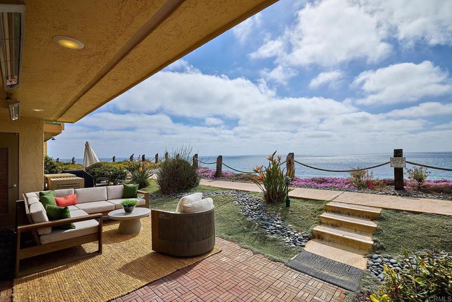 Experience the epitome of coastal luxury in this remodeled oceanfront condo done to perfection! This single level unit on the main floor boasts amazing unobstructed ocean views from almost every room and direct beach access just steps from your door. The home was exquisitely designed with a sleek, modern aesthetic and meticulous attention to detail. Imported Italian marble countertops and backsplash in the kitchen and bathrooms, high-end European-style soft-close cabinets and drawers, premium appliances with custom cabinet fronts. Both bathrooms have been fully renovated with imported Italian marble, textured wall tiles, high-end faucets, and Toto toilets; the primary bath boasts heated floors and a luxurious shower. Additional upgrades include in unit washer/dryer, Rejuvenation Hardware cabinet pulls and door hardware, high-end vinyl plank flooring, recessed ceiling lights throughout, a newer zoned Heat/AC system, voice activated automatic blinds, custom entertainment center, and surround sound system. Expansive outdoor patio with built in heaters offers the perfect spot to enjoy gorgeous sunsets and panoramic ocean views. The HOA permits short-term rentals with a 7-night minimum, making this property an excellent opportunity for vacation rental income. Enjoy community amenities including a pool, two hot tubs, four tennis courts, clubhouse, and gated entry. Unit includes two assigned side by side parking spaces in secured garage and additional storage unit. Solana Beach is one of the most coveted locations in coastal San Diego, and is located minutes from the vibrant Cedros Design District and Del Mar Fairgrounds. Walk to restaurants, cafés, bakeries, train station, farmer’s market, art galleries, music venues, and much more. Come live the Southern California lifestyle you’ve always dreamed of!