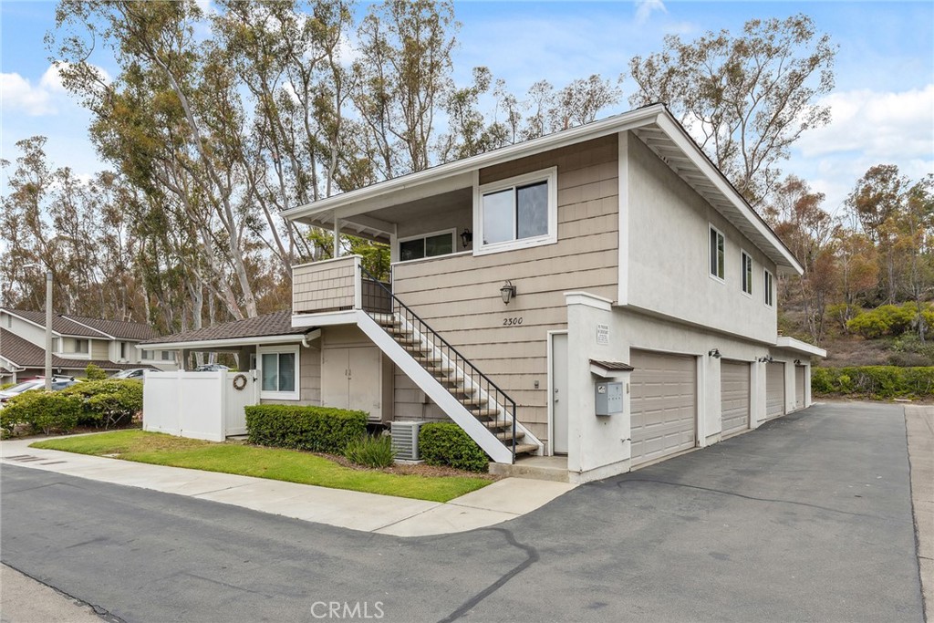 Welcome to your personal oasis in the heart of the renowned Coyote Hills Bluff community — celebrated for its unique resort-style ambiance, surrounded by mature trees, scenic hiking trails, parks, and premier golf courses. This upper-level home offers special privacy and a large deck, perfect for savoring the peaceful surroundings.
Step inside to discover a free-flowing entertainment space, where expansive living and dining areas are bathed in natural light from view windows. The open bar connects seamlessly to a spacious kitchen, ideal for hosting lively parties or enjoying relaxed, informal meals.
Tucked away in a private wing, you’ll find two comfortable bedrooms, including a generous primary suite complete with a walk-in closet. The upgraded full bath features beautiful tilework and a sleek glass shower door, while a convenient laundry/service area adds everyday ease. Laminate flooring flows throughout, and ceiling fans in both bedrooms enhance year-round comfort.
An oversized TWO CAR ATTACHED GARAGE is located directly below the unit for added convenience. The community offers exceptional amenities, including a sparkling swimming pool, spa, tot lot, and basketball court. With easy access to shopping, dining, entertainment, trails, and top-rated schools, this home truly has it all.
Come and experience it for yourself — you won’t be disappointed