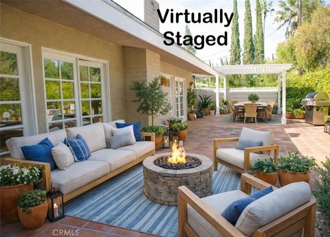 Photo of 5200 Valley Circle Boulevard, Woodland Hills, CA 91367 (MLS # SR26012141)