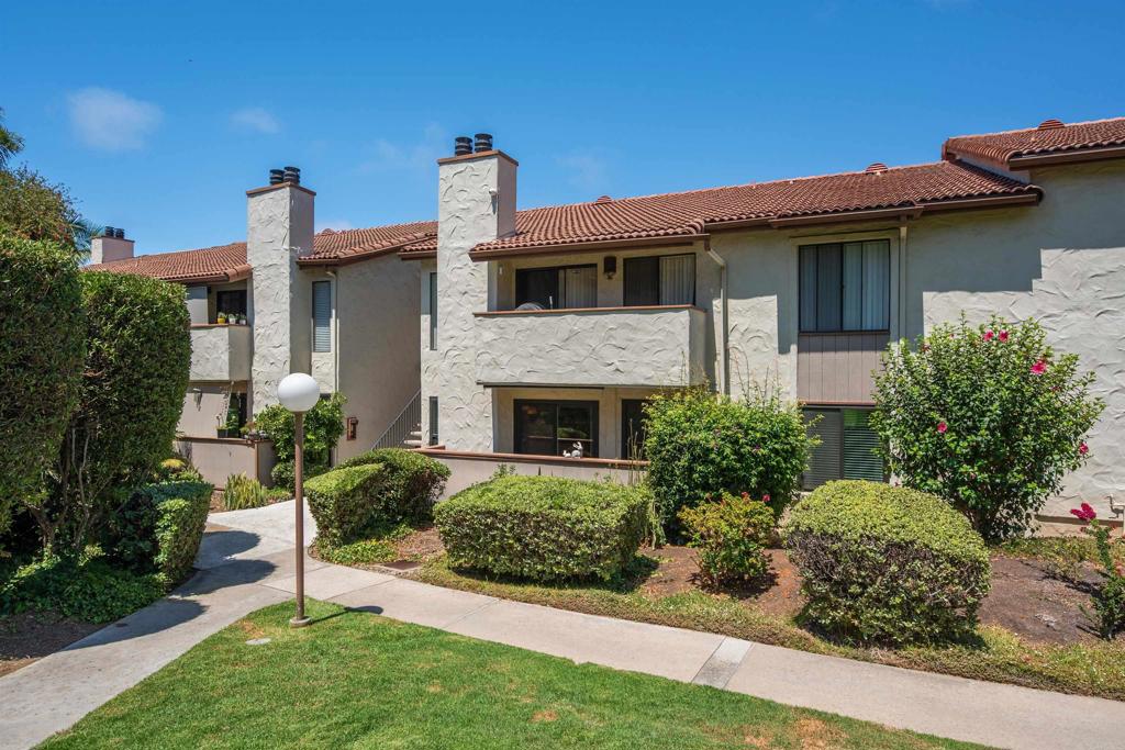 WOW - GREAT UNIT - GATED COMMUNITY - LARGE GREEN BELT ALONG THE EXTERIOR - SHOWS LIKE A MODEL - REAL PRIDE OF OWNERSHIP - UPGRADES GALORE - CUSTOM TOUCHES EVERYWHERE - EXTENSIVE CROWN MOLDING - BEAUTIFUL CUSTOM FIREPLACE AND MANTLE - LOVELY OPEN FLOOR PLAN - EAT-IN NOOK WITH CEILING FAN - KITCHEN FEATURES RECESSED LIGHTING - WHITE CABINETRY WITH NEWER HARDWARE - STAINLESS STEAL DISHWASHER - LOVELY REMODELED BATHS - NEWER MIRRORS - LIGHTING - LARGE MASTER - SPACIOUS WALK-IN - WASHER AND DRYER IN UNIT - LARGE PATIO AREA - GREAT FOR RELAXING - DUAL GLAZED WINDOWS AND SLIDER - PORTABLE AC - ENJOY POOL AND SPA - ONE CAR GARAGE - CLOSE TO FREEWAYS AND SHOPPING