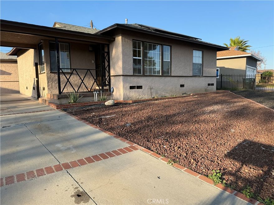 Beautiful family home that has recently been painted the entire inside with good size rooms and bathrooms that recently remodeled, with central air and heating for those hot and cold days with its own private back yard for BBQ's for family gatherings, Owner does stay in the back unit that is also being worked on. This area is very quiet and very family oriented.