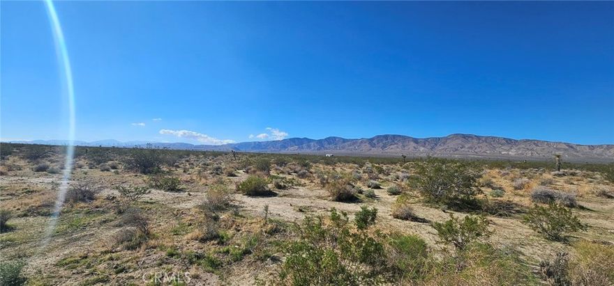 Investors! Flat land just north of highly travelled Hwy 58 & Hwy 14. Not far from the future Mojave Inland Port. 10 acres.