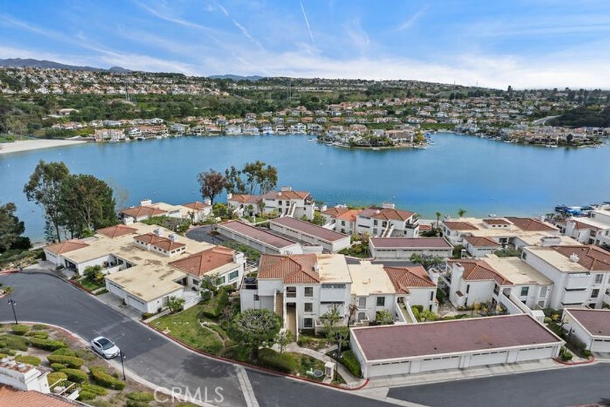 SELLER... WILLING TO OFFER A POINT ...........BUY DOWN FOR BUYER LOAN................................

WELCOME HOME to the Mission Viejo Lakeside community of Mallorca. QUICK ESCROW IS OK! This upscale lifestyle living begins at the 24 hour, guard gated community. This turnkey home offers 2 bedrooms, 2 full bathrooms and a 2 car garage.  QUIET LOCATION.  As you enter the front door, your view will take you directly to the back patio lanai and lake views.  Custom flooring, light fixtures, custom railing, and fireplace are some of the features that greet you.  The upgraded kitchen has custom Quartz countertops, glass tile backsplash, stainless steel appliances, a lot of storage cabinets, and a breakfast nook with silhouette blinds.  The kitchen flows to the dining room and living room.  The living and dining rooms have patio doors which lead to the back patio.  The primary suite and ensuite bathroom offers lake views and natural sunlight throughout the day.   The primary bathroom has dual marble vanities, custom countertops,  abundant closet space, remodeled shower and separate toilet area.  The additional bedroom has a full bath.  There is also a full linen cabinetry in the hallway. 

 The wrap around patio lanai has room for a bbq, furniture, table and chairs.  There is an additional utility closet outside for additional storage.  The 2 car garage is next to the unit. Clear termite report.

All of this is located near the end of the cul de sac, and overlooks North Beach at MV Lake.

Lake Mission Viejo membership is included with the monthly hoas. The MV Lake includes Summer lifeguard programs, clubhouse, Summer concert series, movies in the park, beach front, regattas, water sport  rentals, cabanas, docks, pools, spas, BBQs, picnic areas, and so much more.



 The community is  a close proximity to  Lake side dining, hiking and biking trails, shopping, hospitals, colleges, toll roads, freeways, and our World Famous California Coastline.  Surrounding areas are Rancho Santa Margarita, Coto de Caza, Laguna Hills, Lake Forest & Irvine.