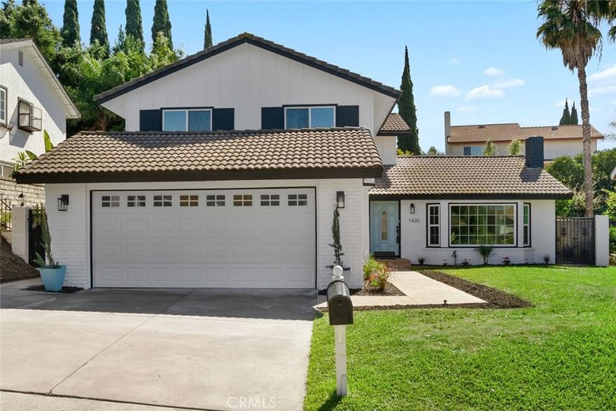 DON’T MISS OUT on this recently updated and spacious TURNKEY home located in a quiet cul-de-sac in one of the most coveted neighborhoods of La Habra! To start off, this home boasts 4 bedrooms and 3 bathrooms including a large master suite with its own luxurious master bathroom and walk-in closet! Throughout the home you'll find LED recess lighting, premium water-proof laminate flooring, a stunning open-concept kitchen containing high-end quartz countertops, a center island with a waterfall finish, a farmhouse sink overlooking the backyard and white shaker cabinets with self-closing drawers! Also, along with the remodeled kitchen there will be a full high-end stainless steel appliance package and wine fridge included! Then, there is a wet bar containing high-end quartz countertops, a sink and white shaker cabinets right next to the cozy living area making the entire space perfect for entertaining days/nights! For the exterior, the front yard contains an attractive curb appeal and a walkway that leads to the inviting front entry while the spacious backyard contains a patio area and freshly laid sod making the entire yard a great space for future family gatherings! In addition, this home offers high efficiency dual-pane vinyl windows throughout and central air/heating! To top it all off, this home is conveniently located within walking distance of multiple shopping centers, such as the Imperial Promenade and the La Habra Market Place, and within minutes of the Westridge Golf Club, Brea Mall and Downtown Brea which both contain beloved restaurants, shops, entertainment and more!