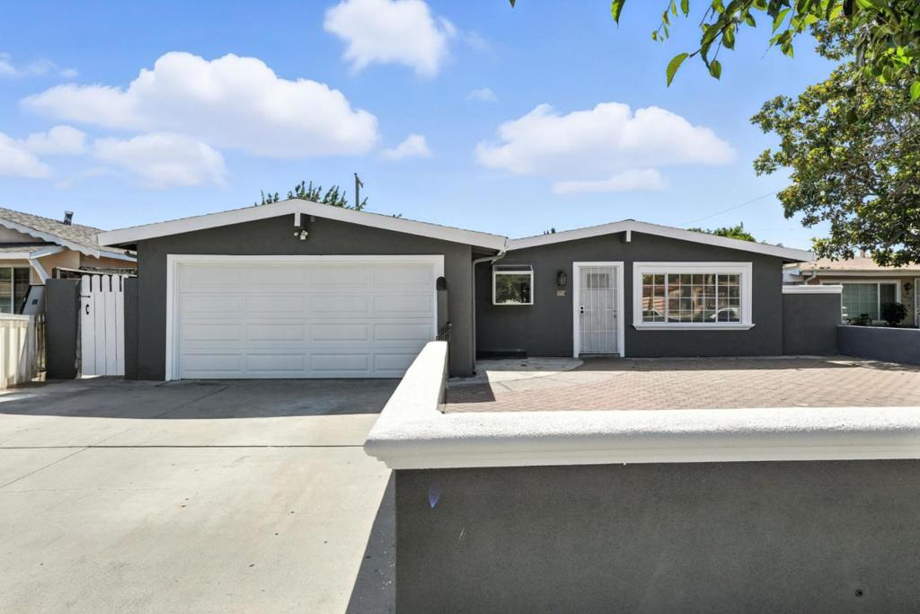 Beautifully upgraded 3BD/2BA home in the heart of San Jose offering 1198 sq. ft. of inviting living space. The updated kitchen includes a dishwasher, oven range, refrigerator, sink, stylish cabinets, and an InSinkErator. Enjoy an open layout with an eat-in kitchen, separate family room with an electric fireplace, and central forced-air heating. Major 2021 upgrades include: laminate wood flooring, fully remodeled bathrooms, LED lights, re-insulation, new roof with shingles, interior/exterior paint, electric fireplace with custom mantle, split AC units in all bedrooms and the living room, pavers in front and back yards, new fence, detached pergola, and front boundary wall. Recent 2025 updates include fresh interior paint, new interior doors, and new closet doors. Dedicated laundry area with washer and dryer included. Spacious two-car garage adds extra convenience. Located in the desirable Mt. Pleasant Elementary School District. This lovingly maintained, move-in-ready gem offers style, comfort, and quality updates throughout. Dont miss the opportunity to make this beautiful home yours. Schedule your private showing today!