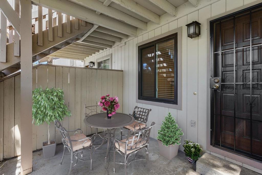 Step into this bright and airy ground-floor townhome-style condo, situated in one of the communitys most peaceful locations, providing greenbelt views. The residence features two spacious bedrooms, two updated bathrooms, and the convenience of in-unit laundry. A private courtyard entry leads to the welcoming living room with a gas-burning fireplace that opens perfectly to the dining area and modern kitchen, complete with stainless steel appliances, ample cabinetry, and a breakfast bar. Stylish lighting and new recessed fixtures throughout add a modern touch. The generous primary bedroom features ample closet space, laminate flooring, and fresh paint. Comfort upgrades include a split AC/heating unit for year-round comfort. Ideal parking with a one-car attached garage featuring an EV hookup plus an additional reserved space. Community amenities include a pool, clubhouse, and beautifully maintained grounds. Conveniently located near Hwy 101, 280, and 680, with easy access to downtown San Jose, San José Mineta International Airport, and Westfield Valley FairTake this excellent opportunity to own in this desirable neighborhood.