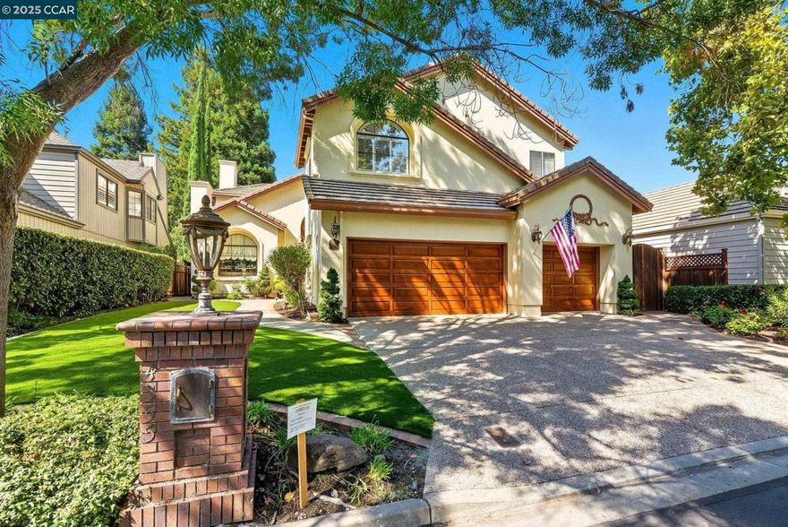 Welcome to this artistic, elegant, and sophisticated home! Enter through the hand-crafted leaded glass door into a warm, spacious interior. A sweeping staircase with custom wrought-iron railings leads to the second floor. The formal living room with plush carpeting flows into the dining room, highlighted by a sparkling crystal chandelier beneath a painted sky ceiling. The gourmet kitchen features rare blue-gray granite counters, custom cabinetry, and a striking copper centerpiece, opening to a bright informal dining area. The step-down family room includes a wet bar and hand-painted vines for added charm. Outside, a private backyard oasis awaits with a mosaic-tiled pool, hot tub, built-in grill with beer tap, and outdoor fireplace—perfect for both entertaining and relaxation. Located near the top of Blackhawk, this home offers access to top-rated schools, parks, golf, shopping, and more. The seller is also willing to leave the luxury designer furniture and décor, with only a few exceptions, making this home move-in ready and effortlessly glamorous. Heating/Cooling replaced in 2023.