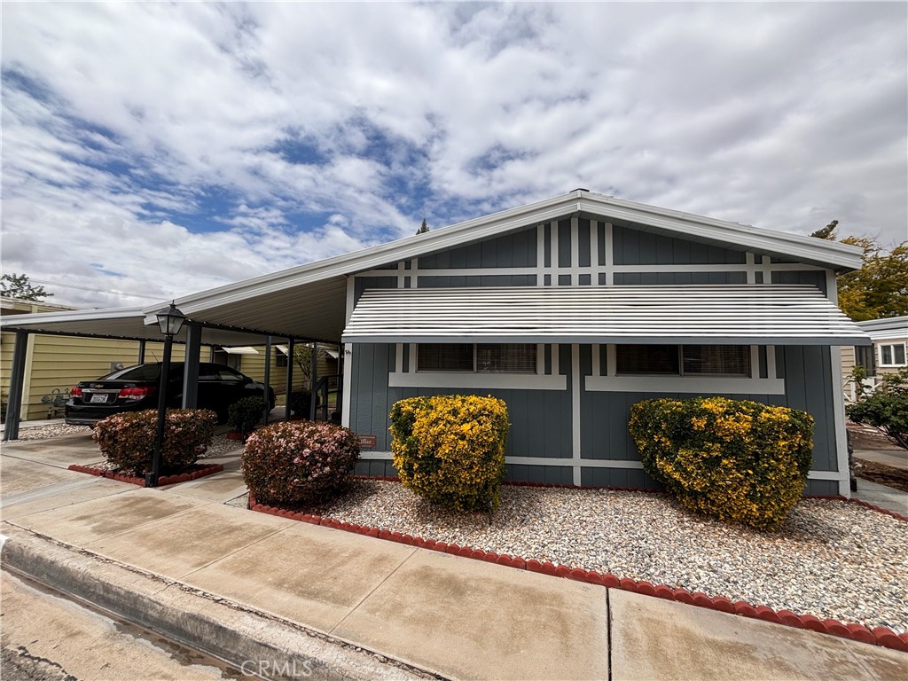 Charming 2-Bed, 2-Bath Home in 55+ Community – Convenient Location!
Welcome to this well-maintained 2-bedroom, 2-bathroom manufactured home located in a peaceful senior community park. This inviting home offers a comfortable layout with spacious living areas, a functional kitchen with indoor laundry room. Step outside to your own little oasis—enjoy a small, private yard space with real grass for easy upkeep, along with a mature tree that provides shade and a touch of nature. Whether you're relaxing with a morning coffee or enjoying an evening breeze, the outdoor space offers a peaceful retreat.
Conveniently situated just off the freeway, you'll have easy access to shopping, dining, and healthcare facilities, while still enjoying the quiet atmosphere of a friendly, age-restricted neighborhood. This home is move-in ready and waiting for you! This property boasts several desirable upgrades and outdoor features, including a new heater and a recently installed water heater for year-round comfort and efficiency. The fully enclosed yard is perfect for pets or outdoor enjoyment, complete with a lush green lawn and two thriving fruit trees—peach and pear—that offer fresh seasonal produce. Inside, the kitchen is equipped with sleek stainless steel sinks, combining durability with modern style.