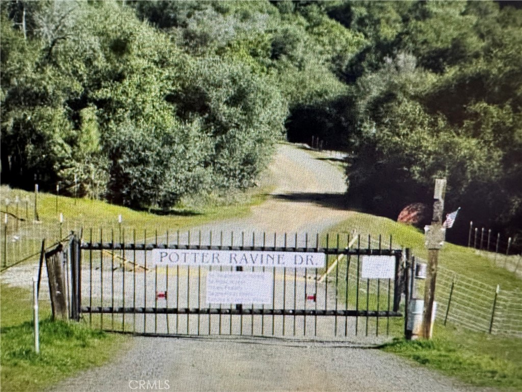 Welcome to one of the premier parcels in the gated Potters Ravine subdivision! This 20.01-acre property offers breathtaking views in every direction: Lake Oroville and the valley below, the Sutter Buttes, the Coastal Range, and the snow-capped Sierras. In the evenings, enjoy the twinkling city and valley lights beneath you, and at night, a spectacular canopy of stars.
This is a great opportunity to own land with incredible potential. The property may include a well, septic system, motorhome pad with utility connections, and underground piping for electric service. A motorhome on site is included with the sale. Buyer to verify all information and conduct their own investigations. Property is sold AS IS.
With 20.01 acres, you have flexibility to choose another homesite or potentially subdivide into four individual 5-acre parcels (buyer to verify).
This is a truly magical place to call home: private, peaceful, and surrounded by natural beauty. Come experience it for yourself!