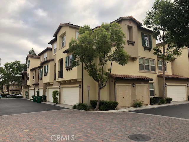 This SPACIOUS, HIGH CEILING, LIGHT-FILLED 2-Bedroom Townhouse Is One Of The LARGEST And BRIGHTEST Units In The Quail Hill Community, Offering Over 1,500 Square Feet Of Living Space. Located In A Beautiful, Quiet Corner, This Home Features SOARING HIGH CEILINGS And An Open Floor Plan That Floods The Space With Natural Light, Creating An Almost House-Like Feel. The Home Includes 2 Bedrooms, 2.5 Bathrooms, A 2-Car Attached Garage, Central AC And Heat, A Large Balcony, And A Cozy Fireplace. The Modern Kitchen Comes Equipped With A Refrigerator, Stove, Microwave, Dishwasher, And Trash Disposal, Plus An In-Unit Washer And Dryer For Added Convenience. You'll Also Enjoy A Separate Dining Area, Ample Storage, A Dedicated Desk Area, And A Linen Closet. As Part Of The Quail Hill Community, You'll Have Access To Resort-Style Pools And Spa, A Fitness Center/Exercise Room, Parks, Playgrounds, And Walking Trails. The Property Is Close To The Quail Hill Shopping Center (With EV Charging, Bike Parking, Shops, And Restaurants), Within Walking Distance To Award-Winning Alderwood Elementary. Rancho San Joaquin Middle School and University High School. Easy Freeway Access To The 405, 133, And 5. You’re Also Just Minutes From The Irvine Spectrum For Shopping, Theaters, And Dining. Excellent Credit 720+, Income Verification, Reserves, And Rental History Are Required; Each Adult Tenant Must Complete An Application. Information Deemed Reliable But Not Guaranteed. This Is A Rare Opportunity To Live In One Of Quail Hill’s Most Desirable Townhomes.