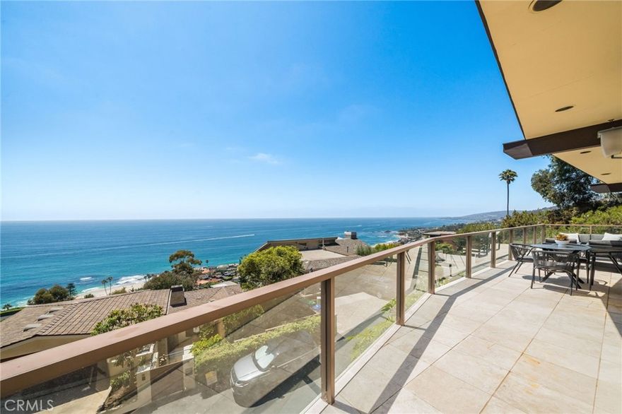 Set overlooking Laguna Beach on the serene and sought-after Coast Royale in Laguna Beach, 31272 Ceanothus Drive takes in panoramic views that stretch from the Montage Resort and Emerald Bay to the distant skyline of Long Beach. Catalina Island sits perfectly centered in the horizon, providing a daily front-row seat to the ever-changing, remarkable sunsets. A spacious deck off the main living area invites the sort of outdoor living we treasure in Southern California, providing a perfect setting to unwind and take in the tranquility. It’s an inspiring backdrop for calm mornings, creative thinking, or simply enjoying the moment.



Inside, the home features soaring beamed ceilings in the living room and beautiful hardwood floors that add warmth and character throughout. The kitchen and living areas flow seamlessly to the outdoor spaces, creating an expansive, view-filled space to relax or entertain. The kitchen is a centerpiece for the home - outfitted to encourage your inner chef in an inspiring setting. The primary suite is privately situated and generously sized, with whitewater views that greet you each morning. Open the windows and let the rhythmic sound of crashing waves lull you to sleep.





In addition to the main living areas, the home includes several versatile flex spaces to suit your lifestyle. One room features built-in shelving and a custom desk, making it ideal for a home office. Another space offers the perfect setting for a home gym or creative studio. An oversized laundry room adds extra function and convenience, with room for storage or expansion. The beach is just a short jaunt, and a favored 'locals' park and restaurants allow you to enjoy life without leaving your neighborhood.







31272 Ceanothus Drive a wonderful opportunity to enjoy elevated coastal living in a peaceful Laguna Beach neighborhood, just minutes from the best of Laguna Beach and southern California!