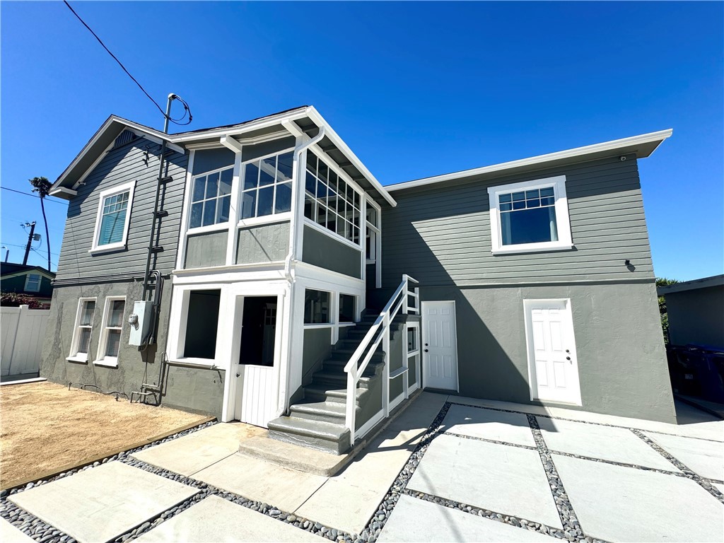 Welcome to this beautifully updated 2-bedroom, 1-bath coastal hideaway in San Pedro’s sought-after Point Fermin neighborhood. Privately set as a back unit perched above the garage, it captures sweeping ocean views from the front porch, the primary bedroom, and even the convenient interior laundry area. Inside, fresh updates and stylish finishes create a bright, inviting atmosphere that blends comfort with coastal charm. Step outside and you’re moments from the water, with easy access to local favorites like Crafted at the Port of Los Angeles, Port Town Brewery, the Korean Bell of Friendship at Angels Gate Park, and the exciting new West Harbor waterfront development—perfect for morning walks, sunset strolls, and weekend exploring. With its prime location, privacy, ocean views, and recent upgrades, this rare Point Fermin find is the perfect place to settle in by the sea.