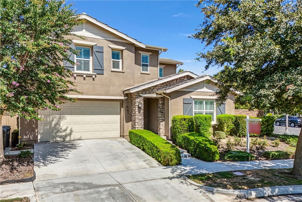 This stunning former model home offers a rare and highly functional layout with the primary suite conveniently located on the first floor. The private owner’s retreat features a spacious walk-in closet and spa-inspired ensuite bath. Also on the main level, a secondary bedroom with a full bathroom near the entrance provides the perfect setup for guests or a home office.
Upstairs, two additional bedrooms share a full guest bathroom, alongside a versatile open family room ideal for a play area, study space, or media lounge. Designed with both comfort and flexibility in mind, the home’s thoughtful floor plan works beautifully for multi-generational living or growing households.
Complemented by $100K+ in builder upgrades—including an expansive California room, a professionally finished backyard, high-quality laminate flooring, and an upgraded kitchen—this home stands apart from the rest.
Located in the desirable Ontario Ranch community with lower taxes and low HOA, residents enjoy access to a clubhouse, pool, tot lot, game room, and basketball courts, all while being minutes from schools, freeways, Ontario Airport, Ontario Mills, and Victoria Gardens. A perfect blend of luxury, function, and location—this one won’t last!