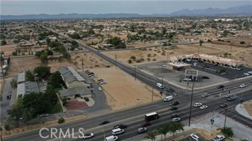 ±0.75 Acre Lot on a signalized corner of Bear Valley Road and 7th Ave.  Parcel is less than 2 miles from Interstate and has over ±55,000 average daily traffic counts. Subject property is located on the southeast corner of Bear Valley Road and 7th Avenue on the border of Hesperia and Victorville. Directly across the street from Food for Less, Rite Aid and Metro PCS. Adjacent property features Arco and Little Cesar’s Pizza. Property is less than 2 miles from the Mall of Victor Valley featuring anchor tenants Macy’s and Dick’s Sporting Goods. Convenient access to Restaurant Row on Amargosa Road, including Red Lobster, Olive Garden, Outback Steakhouse, Chili’s, Apple Bee’s, Johnny Carino’s, Freddy’s Steakburgers and more. Property is zoned C-2 General Commercial - All utilities available at site. Central Victor Valley location along heavily traveled Bear Valley Road. I-15 north to Bear Valley Road, exit and turn right, heading East. Property is on the southeast corner of Bear Valley Road and 7th Avenue.