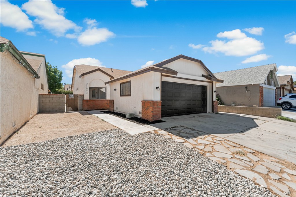 Completely remodeled single-story home located at in East Palmdale!! This beautifully updated property offers over 1,324 sq ft of spacious living with 3 spacious bedrooms and 2 fully remodeled bathrooms. Inside, you'll find a bright open layout and NEW luxury laminate flooring throughout, fresh custom interior paint, and a fireplace in the living room. The brand-new kitchen is a showstopper with custom white cabinetry. Beautiful Home, don't Miss out.