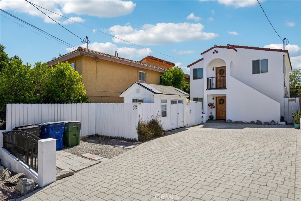 Amazing opportunity to own a completely rebuilt duplex, perfect for an extended family, an owner-user, or a savvy investor. Rebuilt from the ground up in 2021, this property was meticulously designed to maximize space and offer a welcoming, modern feel. The rental income from one unit can provide a powerful financial advantage, helping you build equity faster. The identical floor plans of each unit provide comfortable and private living arrangements for multi-generational families. Move in and start enjoying your new home immediately without the stress and cost of a remodel, or rent one or both units and enjoy immediate return on your investment. Both units share the same 2-bedroom, 1-bathroom layout and are finished to the same high standard. Every element was replaced during the rebuild, including luxurious flooring, new kitchens with new appliances, and new bathrooms. The property also features new plumbing with tankless water heaters, a new electrical system, new heaters, a new roof, and new windows. Each unit includes its own in-unit laundry facilities for added convenience. The property provides ample parking for up to 5 cars on the front driveway. The owner has also thoughtfully added a studio and a shed, both with solar power (perfect for a home office, gym, or guest room), and three additional storage units. Low-maintenance landscaping helps keep water bills down. Situated on a quiet street, the location is excellent, with parks, stores, and dining options nearby. Plus, there's easy access to the freeway for a quick commute. This turnkey property is guaranteed to impress. Schedule your visit today to see this outstanding property!