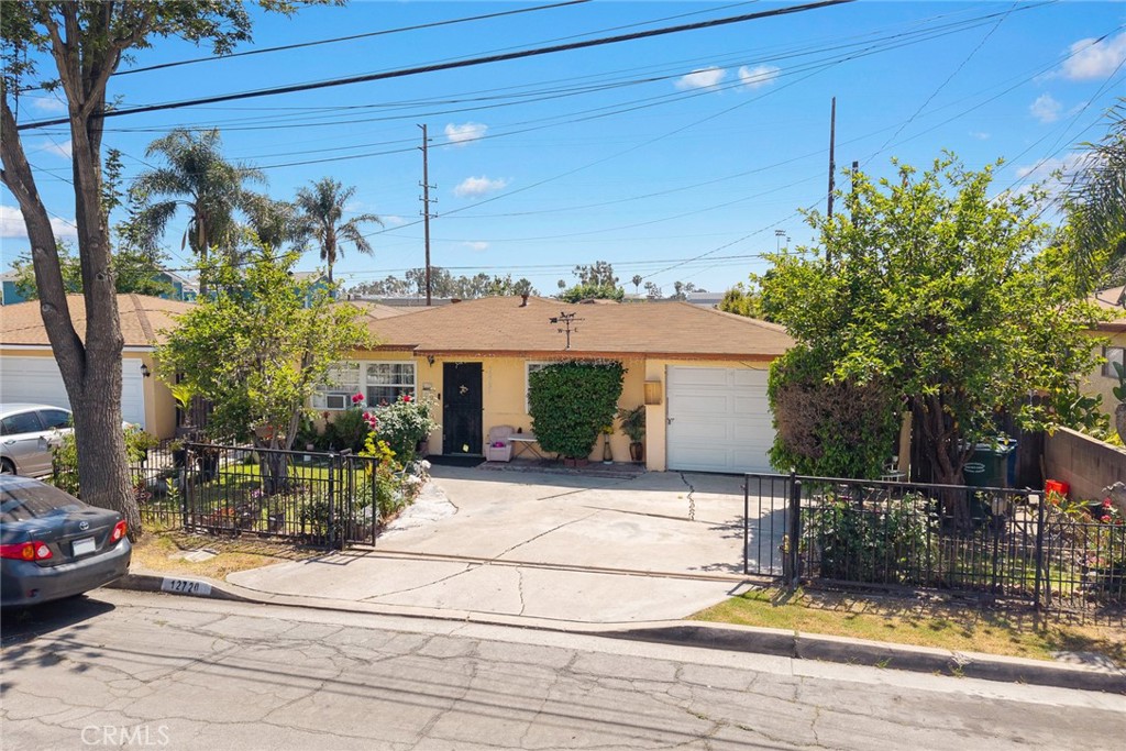 This triplex offers a total of 2,703 square feet of living space, each with its own address, situated on a massive lot of over 9,867 square feet. The property consists of multiple rental units generating strong monthly income, great for investors seeking long-term returns. Each unit has a garage for parking and storage. All units are occupied with reliable income. Situated in a desirable Whittier neighborhood, this property is conveniently located near schools, shopping centers, and major freeways, ensuring easy access to all that the area has to offer.