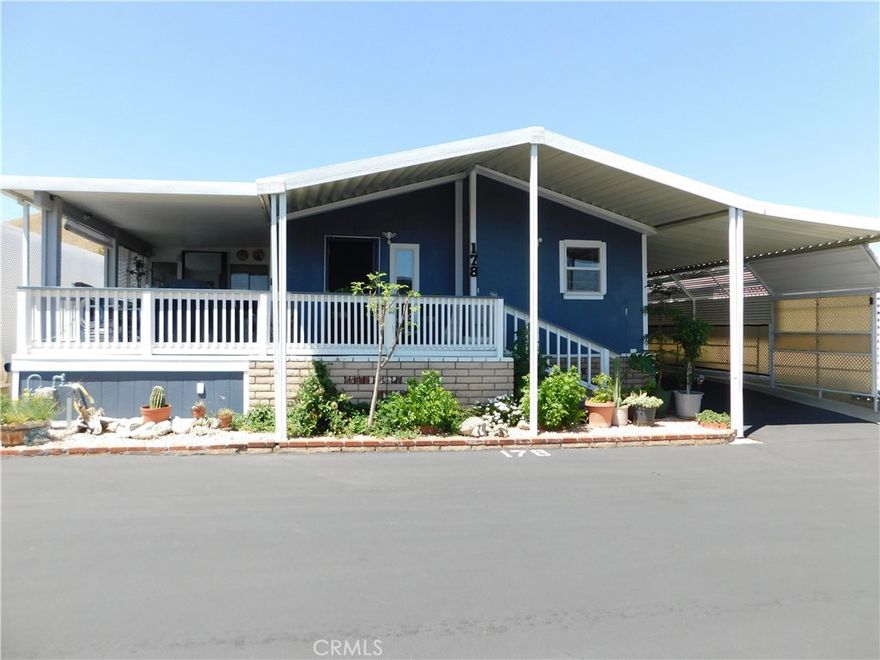 $$$ REDUCED $$$ ~GORGEOUS 3 BEDROOM WITH EXCEPTIONAL VIEWS REMODELED TO PERFECTION AND SITUATED ALONG THE PERIMETER, LOCATED IN BANNING'S 55+ COMMUNITY OF SUNRISE ESTATES~PRIDE OF OWNERSHIP SHOWS THROUGHOUT!!!!~FEATURES AND UPGRADES INCLUDE....DUAL PANE WINDOWS, HARDWOOD FLOORS RECENTLY REFINISHED WITH BEHR POLYURATHENE GLOSS IN MAY 2025, SUNROOM/PATIO ENCLOSURE BUILT IN MARCH OF 2020, EXTENSION OF PORCH TO CREATE A WRAPAROUND PORCH IN 2020, FRESHLY PAINTED INTERIOR IN 2023 INCLUDING WALLS, DOORS & CABINETS, EXTERIOR PAINT IN 2025 INCLUDING PATIO, STEPS AND ENTRY, WHOLE HOUSE WATER SOFTENER AND SEDIMENT FILTER AUG 2023,NEW WATER HEATER IN 2022, ROOF SEALED IN APRIL 2025 WITH HENRY'S 287 SOLAR-FLEX WHITE SEALANT APPROX $1500, 3 BRAND NEW RETRACTABLE SCREEN DOORS IN MAY 2025, ENCLOSED CARPORT IN 2021,BACKYARD AUTOMATIC SPRINKLERS IN APRIL 2023, BACKYARD GARDEN STARTED IN APRIL 2020 PLUS DRIVEWAY RESEALED IN MAY 2025~BRIGHT LIVING ROOM WITH CATHEDRAL CEILINGS~SPACIOUS DINING ROOM~KITCHEN WITH CABINETS & COUNTER SPACE GALORE PLUS PASS THROUGH TO THE LIVING ROOM...FRIDGE INCLUDED~PRIMARY BEDROOM IS KING SIZE WITH CEILING FAN~PRIMARY BATH HAS DOUBLE SINK VANITY, SEPARATE SHOWER WITH ENCLOSURE PLUS WALK-IN JETTED TUB~2ND BEDROOM IS FULL SIZE WITH CEILING FAN~3RD BEDROOM (NO CLOSET) IS CURRENTLY BEING USED AS AN OFFICE...ALSO PERFECT FOR HOBBY ROOM ETC~SECONDARY BATHROOM HAS TUB/SHOWER~SEPARATE LAUNDRY ROOM WITH PLENTLY OF STORAGE SPACE...NEWER WASHER/DRYER IN 2021 INCLUDED~BRIGHT & WELCOMING SUNROOM WITH WALL AC~HUGE ENCLOSED PATIO PERFECT FOR ALL YOUR STORAGE NEEDS~THE BACKYARD IS A GARDENER'S PARADISE WITH SO MANY BEAUTIFUL PLANTS AND BUSHES PLUS PLENTY OF FRUIT TREES INCLUDING NECTARINE, ORANGE, APPLE, LEMON, POMEGRANATE, AVOCADO PLUS GRAPES, RASPBERRIES, BLACKBERRIES AND STRAWBERRIES~ENJOY THE RELAXING PRIVATE WRAPAROUND FRONT PORCH WITH AMAZING VIEWS~H U G E 2-3 VEHICLE CARPORT~SHED/WORKSHOP~***CALL FOR A TOUR, YOU WILL DEFINITELY BE IMPRESSED***