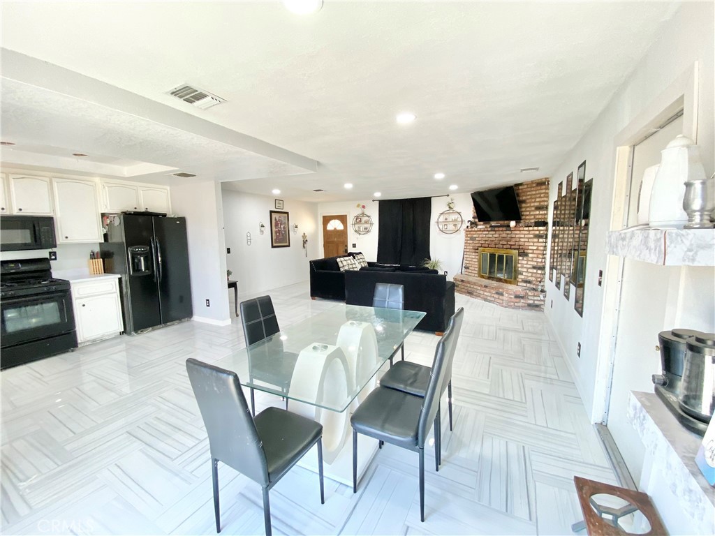 Welcome to this beautifully updated 3-bedroom, 2-bath home in the heart of Hesperia—perfect for families, outdoor enthusiasts, or anyone looking for space to spread out and enjoy the High Desert lifestyle.
Step inside to find fresh tile flooring, a brand-new roof, and new energy-efficient windows that keep the home cool in summer and cozy in winter. The spacious floor plan flows effortlessly, offering comfortable living and dining areas, plus a large bonus room that can easily serve as a home office, guest room, or fourth bedroom.
Outside, you’ll love the open backyard layout—ideal for entertaining or simply relaxing. Take a dip in the oversized above-ground pool, or take advantage of the RV access and extra space to park your desert toys, trailers, or off-road vehicles.
Don’t miss your chance to own a move-in ready home with great upgrades and tons of potential. Schedule your private tour today.