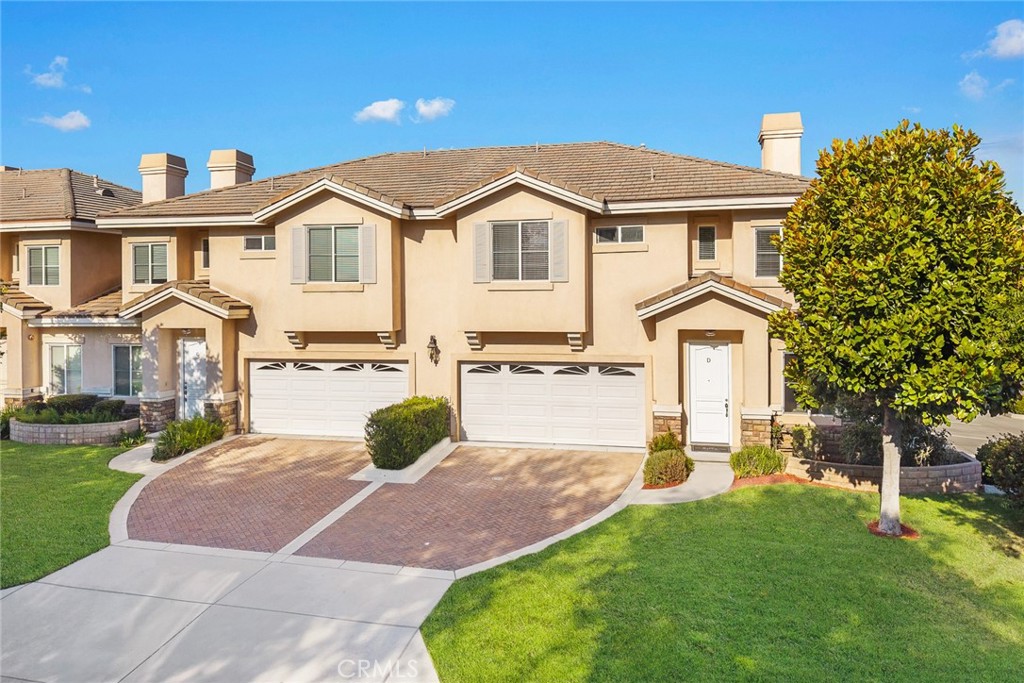 This impeccably maintained end-unit townhouse, built in 2006, is situated on a quiet and peaceful street in the heart of Arcadia. The home offers exceptional convenience—just minutes from 99 Ranch Market, The Shops at Santa Anita, local parks, and a variety of restaurants. It also falls within the boundaries of the award-winning Arcadia Unified School District, including Hugo Reid Elementary, Foothills Middle School, and Arcadia High School.
As you enter, you're welcomed by a warm and inviting living room, alongside a formal dining room that opens to a well-appointed kitchen. The kitchen features high-quality granite countertops, a breakfast bar, and elegant crown molding. A separate family room offers the perfect space for gatherings and can also be converted into a fourth bedroom if desired.
The home features solid hardwood flooring throughout the upstairs, with durable laminate hard flooring on the stairs and second floor. A beautifully designed wrought iron staircase adds a touch of sophistication and charm.
Upstairs, a versatile loft area provides a perfect space for a home office or reading nook. The spacious primary suite includes a large walk-in closet, a luxurious Jacuzzi tub, a separate shower, and dual granite vanities. Two generously sized guest bedrooms share a well-maintained full bathroom.
The home includes an attached two-car garage with a private driveway, allowing for parking of up to four vehicles . Additional guest parking is available within the community. The private backyard is perfect for barbecues, relaxing, or gardening.
This home also benefits from low HOA fees, making it an exceptional value in one of Arcadia’s most desirable neighborhoods.
Don’t miss this rare opportunity to own a stylish, well-located townhouse in a prime Arcadia location!