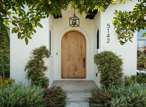 Photo of 5142 Brynhurst Avenue, Los Angeles, CA 90043 (MLS # AR25162552)