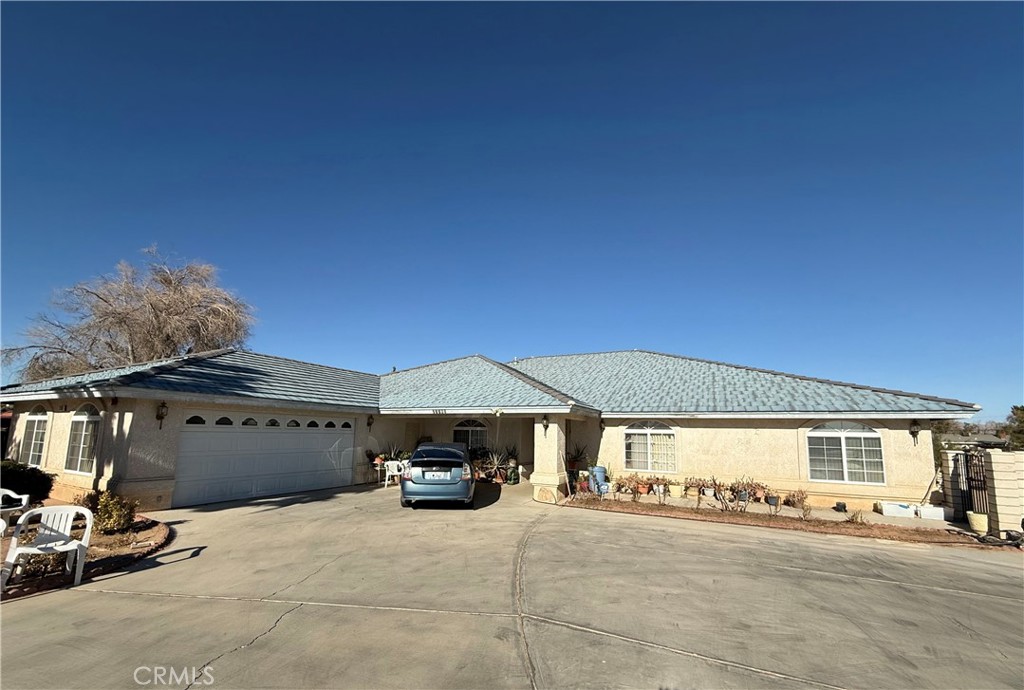 Spacious and versatile, this single-story home in Apple Valley offers 7 bedrooms and 4 bathrooms across approximately 3,600 square feet of living space, all set on a generous 1-acre lot. The property was previously licensed and operated as a 6-bed RCFE (Residential Care Facility for the Elderly), making it a standout opportunity for buyers interested in residential care, assisted living, or similar use. Zoned RL (Rural Living), the lot offers flexibility for residential or care-related operations, including potential accessory structures, small-scale agriculture, or expansion — subject to local regulations.
The home features a well-designed, open layout with wide hallways, multiple common areas, and excellent natural light throughout. Recent interior upgrades include modern gray shaker-style cabinetry, updated hardware, and recessed lighting in the kitchen, as well as durable tile flooring in high-traffic areas. The bedrooms and hallways are finished with wood-style laminate for a warm, clean look. All seven bedrooms are generously sized, ideal for residents, guests, or multi-use setups. Four full bathrooms are well-positioned to serve both private and shared spaces efficiently.
Outside, the property features a circular driveway with ample parking for staff, residents, or visitors. The lot is flat and usable, with mature desert landscaping and room for future additions such as patios, gardens, or outbuildings. The home is ideally located right on US Highway 18, providing high visibility and convenient access for both personal and professional use.
Nearby amenities include Apple Valley High School, Rio Vista Elementary, and Vanguard Preparatory, all within a short drive. Providence St. Mary Medical Center is less than 10 minutes away, making it ideal for care-oriented operations. For shopping, dining, and services, the Jess Ranch Marketplace is just down the road. Residents and visitors can also enjoy local attractions like the Apple Valley Civic Center Park, Horsemen’s Center Park, Victor Valley Museum, and outdoor recreation at Sycamore Rocks and Deep Creek.
This home offers an excellent mix of livable space, business potential, and convenient location. Whether you’re seeking to reopen an RCFE, start a care business, or simply need a large home with room to grow, this is a rare and valuable opportunity in the heart of Apple Valley.