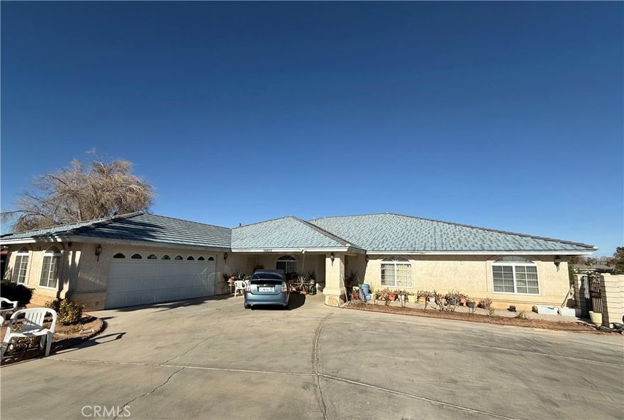 Spacious and versatile, this single-story home in Apple Valley offers 7 bedrooms and 4 bathrooms across approximately 3,600 square feet of living space, all set on a generous 1-acre lot. The property was previously licensed and operated as a 6-bed RCFE (Residential Care Facility for the Elderly), making it a standout opportunity for buyers interested in residential care, assisted living, or similar use. Zoned RL (Rural Living), the lot offers flexibility for residential or care-related operations, including potential accessory structures, small-scale agriculture, or expansion — subject to local regulations.



The home features a well-designed, open layout with wide hallways, multiple common areas, and excellent natural light throughout. Recent interior upgrades include modern gray shaker-style cabinetry, updated hardware, and recessed lighting in the kitchen, as well as durable tile flooring in high-traffic areas. The bedrooms and hallways are finished with wood-style laminate for a warm, clean look. All seven bedrooms are generously sized, ideal for residents, guests, or multi-use setups. Four full bathrooms are well-positioned to serve both private and shared spaces efficiently.



Outside, the property features a circular driveway with ample parking for staff, residents, or visitors. The lot is flat and usable, with mature desert landscaping and room for future additions such as patios, gardens, or outbuildings. The home is ideally located right on US Highway 18, providing high visibility and convenient access for both personal and professional use.



Nearby amenities include Apple Valley High School, Rio Vista Elementary, and Vanguard Preparatory, all within a short drive. Providence St. Mary Medical Center is less than 10 minutes away, making it ideal for care-oriented operations. For shopping, dining, and services, the Jess Ranch Marketplace is just down the road. Residents and visitors can also enjoy local attractions like the Apple Valley Civic Center Park, Horsemen’s Center Park, Victor Valley Museum, and outdoor recreation at Sycamore Rocks and Deep Creek.



This home offers an excellent mix of livable space, business potential, and convenient location. Whether you’re seeking to reopen an RCFE, start a care business, or simply need a large home with room to grow, this is a rare and valuable opportunity in the heart of Apple Valley.