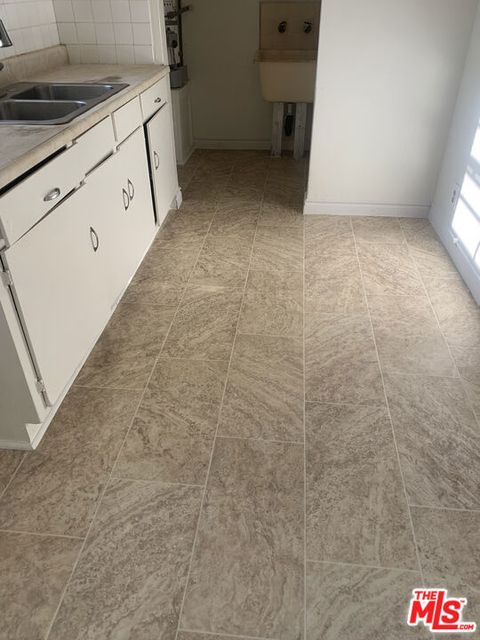 Photo of 107 W 84th Place, Los Angeles, CA 90003 (MLS # 26711071)