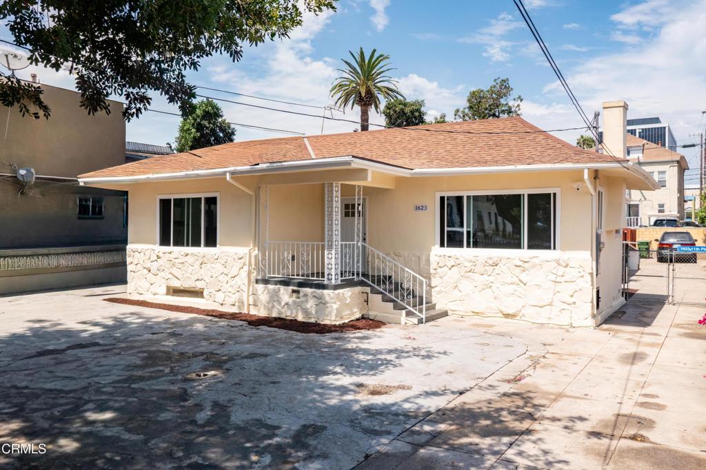 Beautifully Remodeled Craftsman in the Heart of Downtown LA! This fully renovated 4-bedroom, 2-bath home offers 1,500 sq ft of stylish living space in one of the city's most desirable zip codes. Just steps from LA Live, Staples Center, and top restaurants, the home features a brand-new kitchen with granite countertops, custom cabinets, updated flooring, and modernized bathrooms. Fresh two-tone paint inside and out brings a bright, airy feel while preserving the Craftsman charm. The property includes a gated entry, a 2-car driveway for security and convenience, and breathtaking city light views. With its prime location and thoughtful upgrades, this home is perfect for families or professionals seeking the best of Downtown LA living.