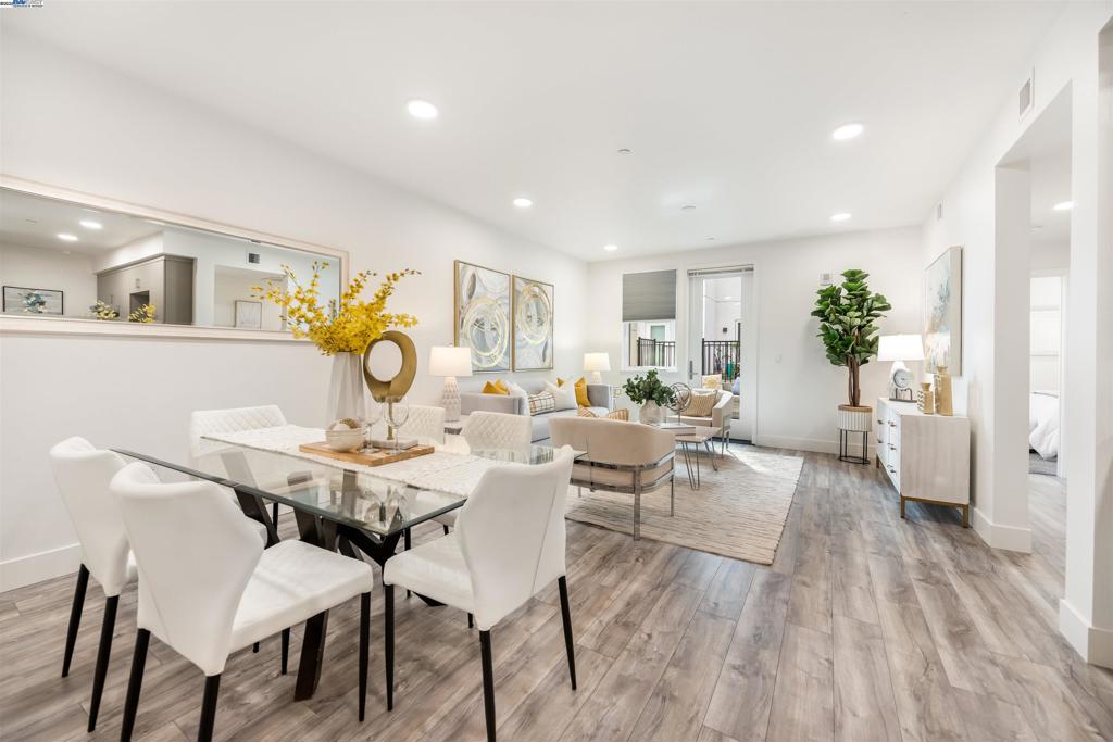 Welcome to this stunning 2023 built townhome-style condo in Fremont’s highly desirable Irvington neighborhood. Best priced 3 bedroom, 3 bathroom home in all of Fremont! This home features the largest floor plan in the community, offering generous living space across two levels and a rare oversized patio with direct access to a private terrace. The main level includes a full bedroom and bathroom, while the upper level offers two spacious bedrooms with en-suite baths and a convenient hallway laundry closet. HOA dues include hot water, gas for cooking, central heating and garbage. Enjoy access to premium community amenities including a fitness center, playground, BBQ area, dog park and wash station, secure mailroom with package lockers, and gated parking with two assigned spaces. Located near top-rated schools like Grimmer Elementary and Irvington High, this home offers it all.