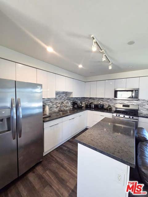 Photo of 2651 S Hobart Blvd BLVD #1, Los Angeles, CA 90018 (MLS # 26876671)