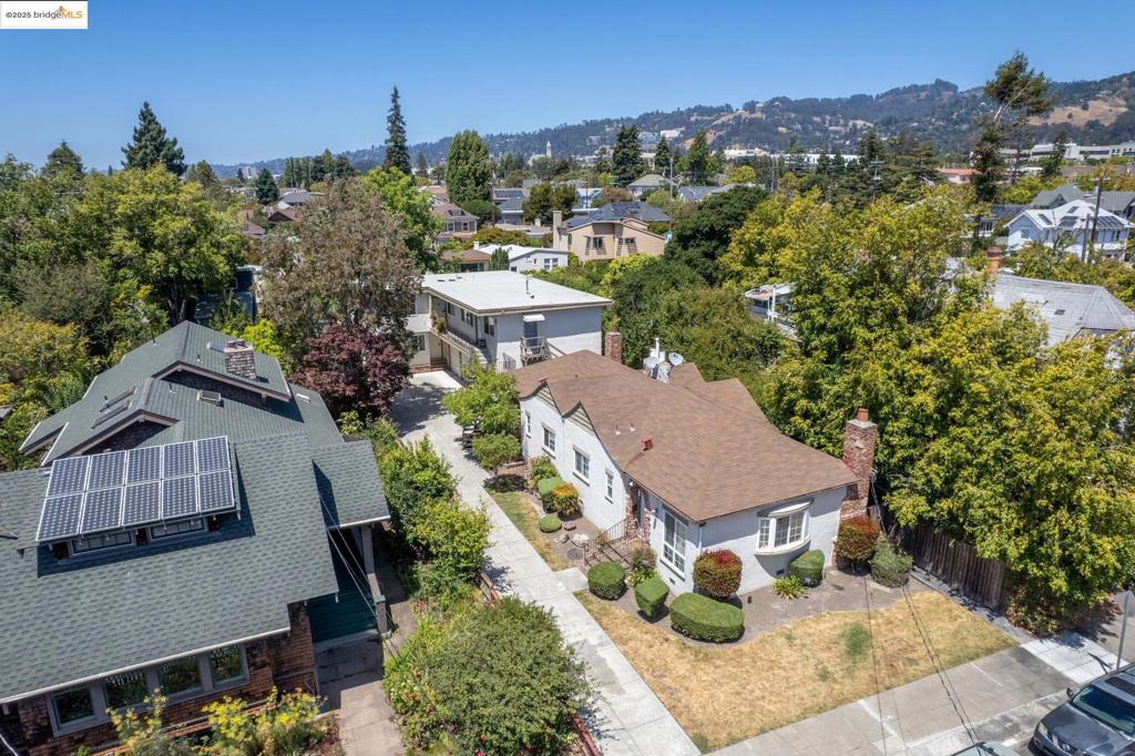 To access marketing package copy/paste: https://bit.ly/kitehillre. Located on a quiet, well-kept street at the highly sought-after Berkeley/North Oakland border, this five-unit property offers unbeatable convenience near Whole Foods, Berkeley Bowl, Ashby BART, and the vibrant shops and restaurants along Telegraph Avenue. The property features a front duplex with charming cottage-style units and a triplex tucked away in the rear, providing a flexible and desirable mix of rental options. Five vacant garages offer excellent potential for additional income or secure tenant storage, while a long private driveway ensures ample off-street parking. One spacious two-story unit (2 bed / 1.5 bath) may be delivered vacant—perfect for an owner-occupant or to command premium rental rates. There’s also the opportunity to add in-unit laundry hookups, further enhancing tenant convenience and value. The property is in excellent condition, with all units well maintained and water heaters replaced just 2–3 years ago.
