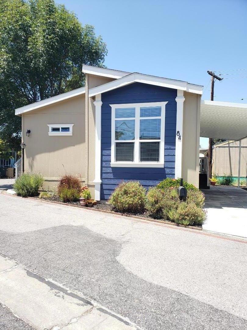 Welcome to this charming 7 year young corner home located in the all ages desirable Moffett Mobile Home Park walking distance to vibrant downtown Mountain View, also walking distance to Light Rail and Caltrain. Easy access to major freeways/highways like 101, 237, and 85. Offering a spacious and bright 995 square feet of thoughtfully designed living space with large windows that brings in plenty of sunlight with 2 spacious bedrooms and 2 full bathrooms for comfortable living. The open concept kitchen is well-equipped with white Whirlpool appliances, a gas oven and range, dishwasher, microwave, while the quartz countertops add a sleek and modern look. The combination of a family room, dining area, and kitchen creates a large and open space for relaxation. The home features a shower over tub in both bathrooms and a laundry area equipped with washer and dryer for added convenience, and ceiling fan for year-round comfort. The flooring throughout the home includes a mix of carpet and engineered wood, catering to both comfort and style. This move-in ready home is located within the desirable Mountain View Whisman School District. Whether you're seeking to downsize or seeking for a well-rounded lifestyle in a vibrant community, this is a place to consider your home.